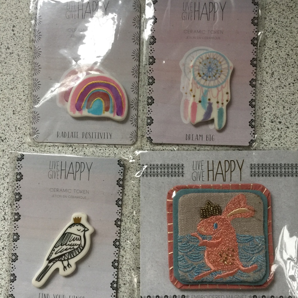 3 ceramic tokens and 1 embroidered magnet